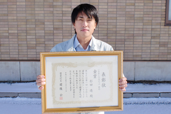 川崎フロンターレサポーター40名が参加したJA会津みどりの稲刈り体験交流会(9月27日)
